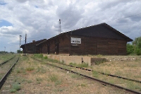 Здание пакгауза, где в марте 1917 г. проходило первое собрание по созданию профсоюза железнодорожников п. Акбулак